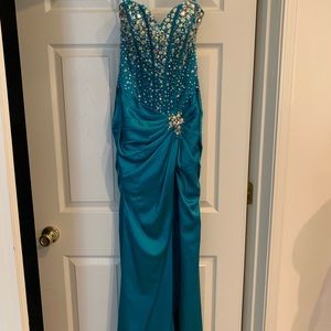 Teal satin prom dress.
